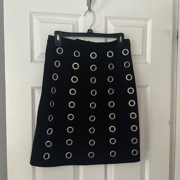 NEW black skirt w/silver grommets-smoke free home - Picture 1 of 2